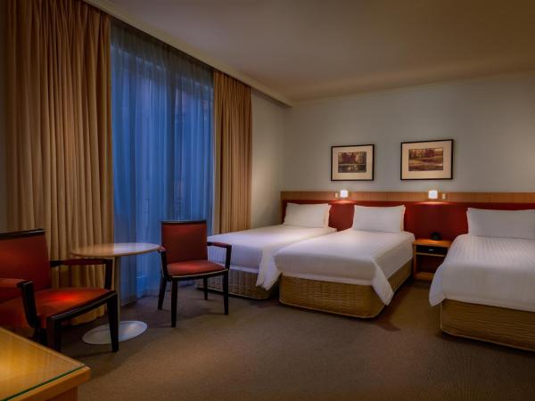 BEST WESTERN PLUS Travel Inn : photo 8 de la chambre chambre triple deluxe