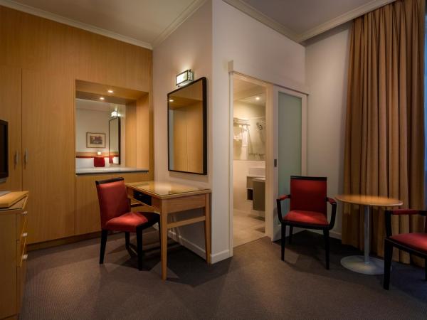 BEST WESTERN PLUS Travel Inn : photo 8 de la chambre chambre lit king-size deluxe