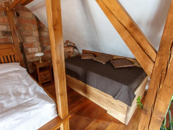 Pension U Hastrmana : photo 2 de la chambre chambre quadruple avec baignoire