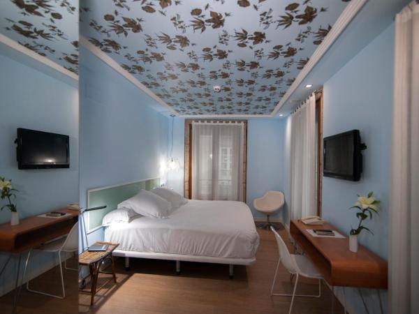 Casas Reais Boutique : photo 8 de la chambre chambre double deluxe avec balcon ou galerie