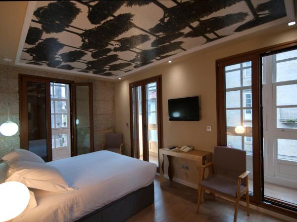 Casas Reais Boutique : photo 5 de la chambre chambre double deluxe avec balcon ou galerie