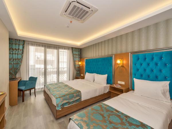 Grand Palace Hotel : photo 1 de la chambre chambre triple deluxe