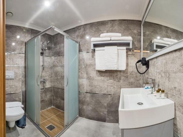 Grand Palace Hotel : photo 7 de la chambre chambre triple deluxe