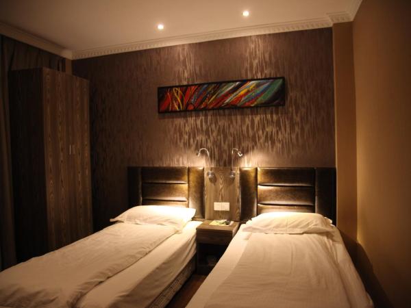 Shanghai Fish Inn Bund : photo 3 de la chambre chambre lits jumeaux deluxe