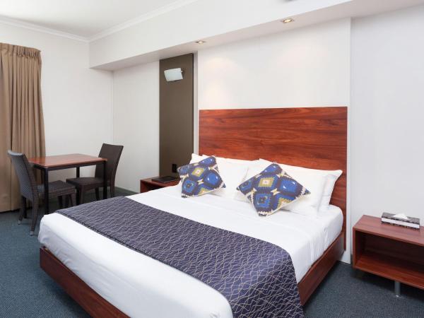Rocklea International Motel : photo 1 de la chambre chambre lit queen-size deluxe
