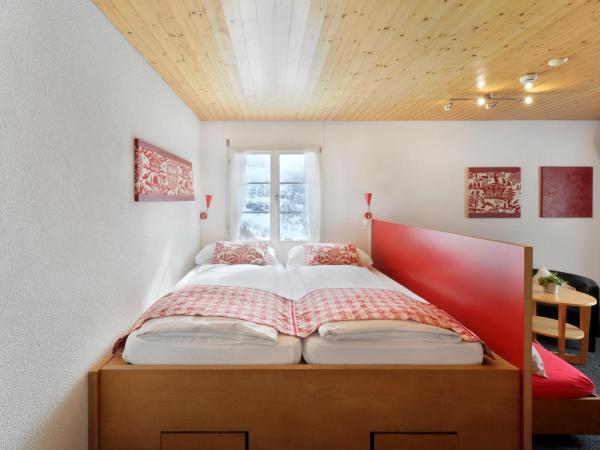 Alpinhotel Bort : photo 4 de la chambre chambre sextuple - vue sur l'eiger