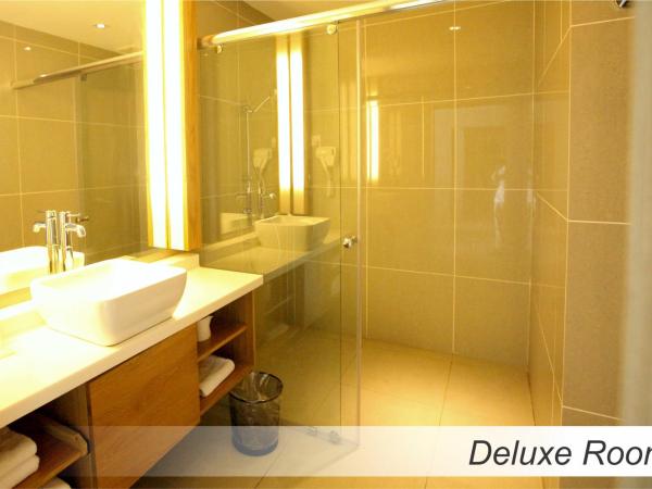 Casuarina@Meru : photo 2 de la chambre chambre lit king-size deluxe