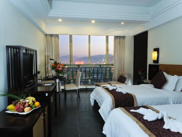 Shengyi Holiday Villa Hotel : photo 7 de la chambre chambre lits jumeaux deluxe - vue sur ville