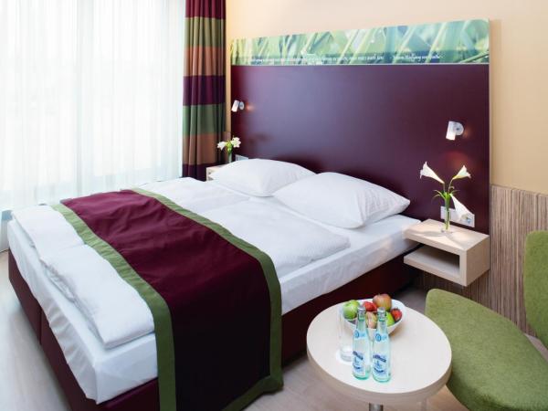 Mövenpick Hotel Frankfurt City Messe : photo 2 de la chambre chambre lit king-size classique