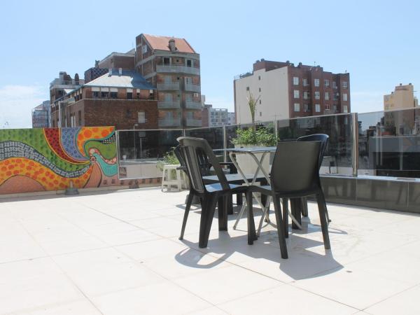 Link Cordoba Hostel : photo 9 de la chambre chambre quadruple avec terrasse 
