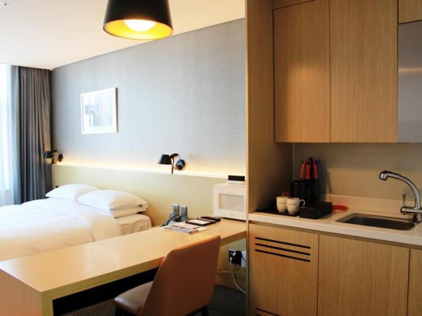 Arirang Hill Hotel Dongdaemun : photo 2 de la chambre chambre double avec kitchenette