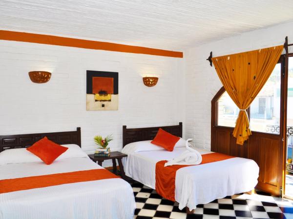 Hotel Hacienda de Vallarta Centro : photo 1 de la chambre chambre quadruple avec kitchenette et climatisation
