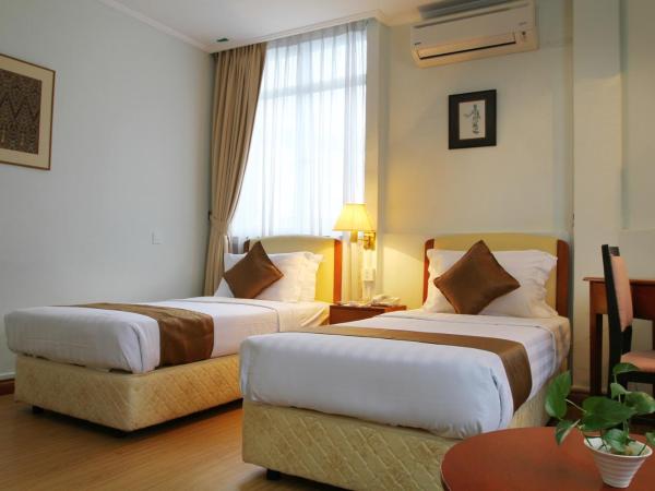 Telang Usan Hotel Kuching : photo 1 de la chambre chambre lits jumeaux standard