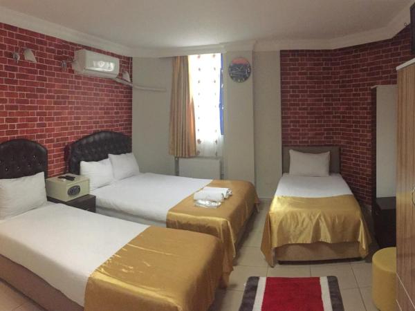 Lotus Hotel : photo 5 de la chambre chambre quadruple standard