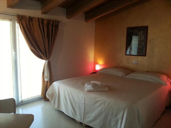 Il Girasole High Quality Inn : photo 3 de la chambre chambre double ou lits jumeaux supérieure