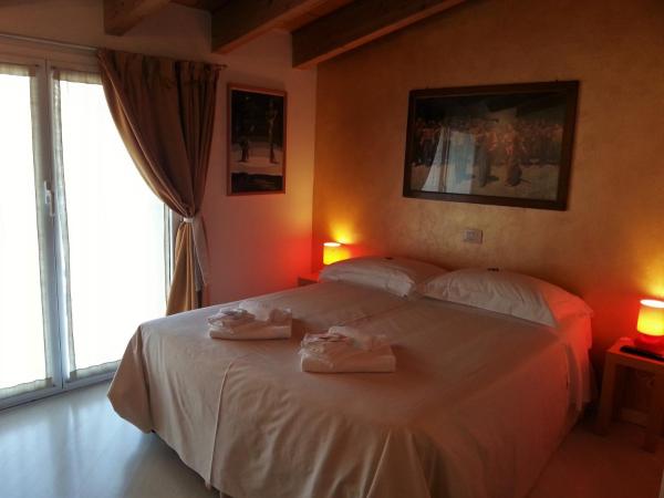 Il Girasole High Quality Inn : photo 5 de la chambre chambre double ou lits jumeaux supérieure