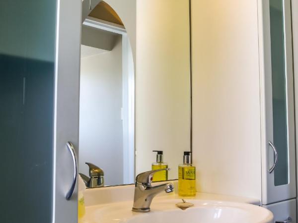 Camelot Motor Lodge : photo 5 de la chambre appartement 4 chambres