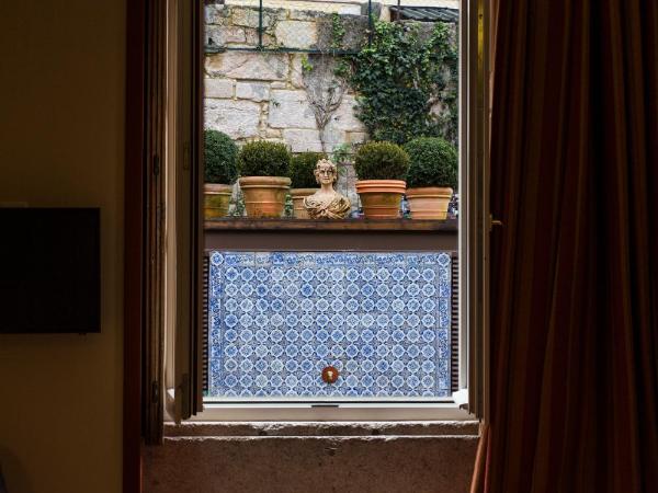 M Maison Particulière Porto : photo 5 de la chambre suite - vue sur jardin