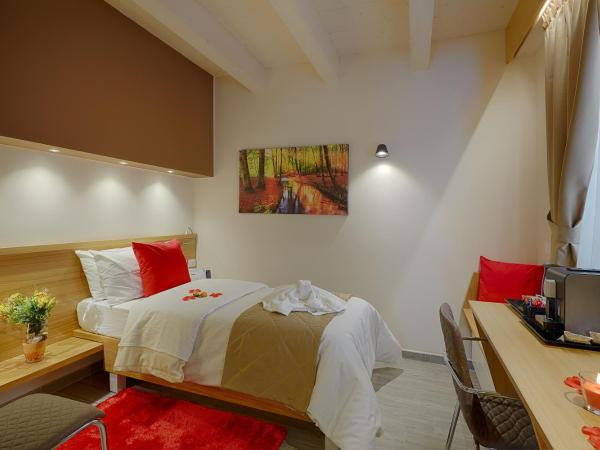 Hospitality Hotel : photo 1 de la chambre chambre simple