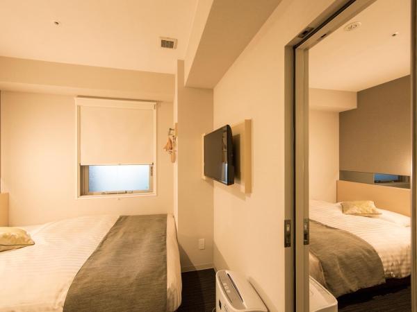 Super Hotel Premier Osaka Honmachi Ekimae Natural Hot Springs : photo 8 de la chambre 2 chambres doubles communicantes - non-fumeurs