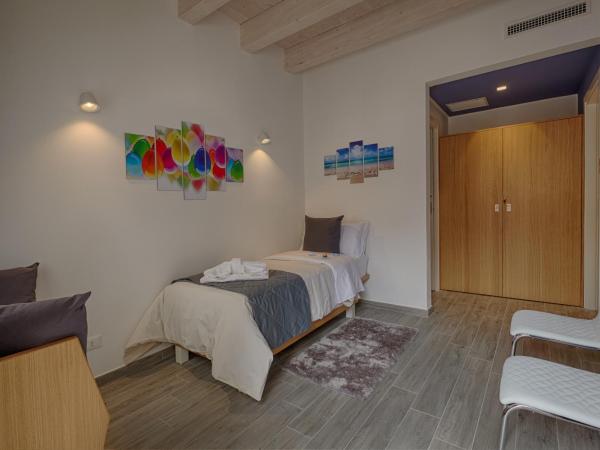 Hospitality Hotel : photo 1 de la chambre chambre triple