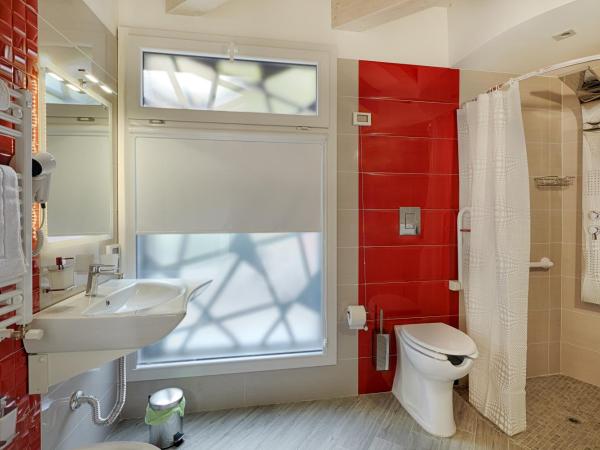 Hospitality Hotel : photo 4 de la chambre chambre triple