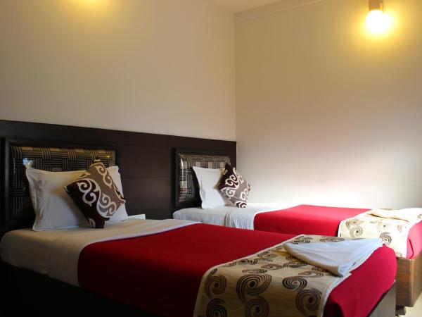 Mount Residency : photo 1 de la chambre chambre lits jumeaux exécutive