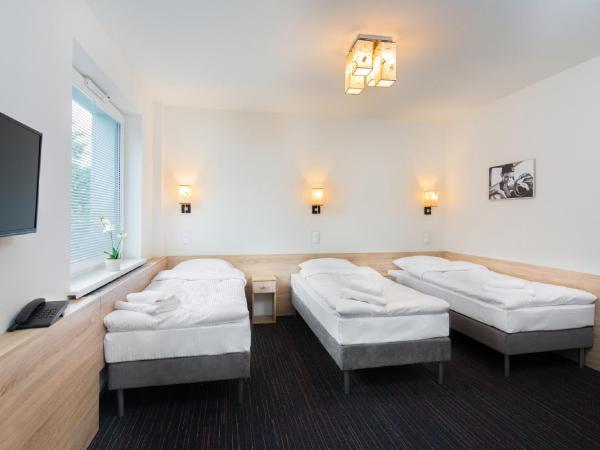 Automobil Hotel : photo 1 de la chambre chambre triple