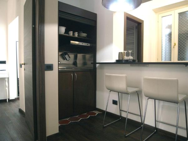 Aparthotel Dei Mercanti : photo 2 de la chambre appartement marron