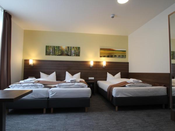 Goethe Conference Hotel by Trip Inn : photo 1 de la chambre chambre triple