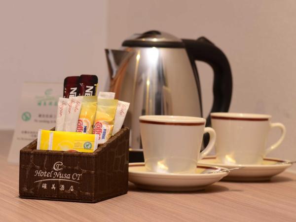 Hotel Nusa CT : photo 4 de la chambre chambre lit king-size supérieure