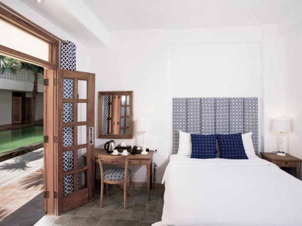 Adhisthana Hotel Yogyakarta : photo 2 de la chambre hébergement double supérieur - vue sur piscine