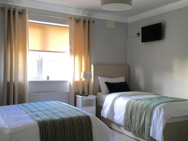 Westwinds Guestlodge : photo 6 de la chambre chambre triple