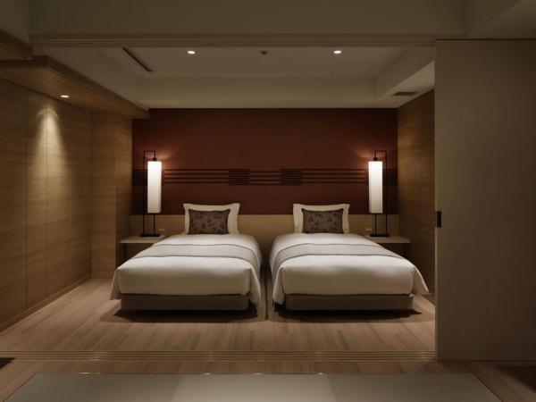 Kobe Minato Onsen Ren : photo 3 de la chambre deluxe twin room with tatami area and terrace - ocean view