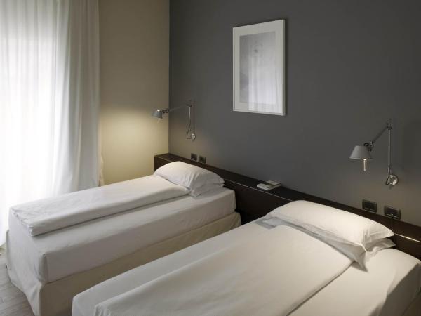 I Portici Hotel Bologna : photo 4 de la chambre chambre lits jumeaux supérieure