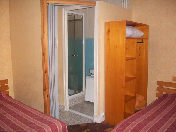 Hotel L'Aiglon : photo 1 de la chambre chambre familiale (2 adultes et 2 enfants)