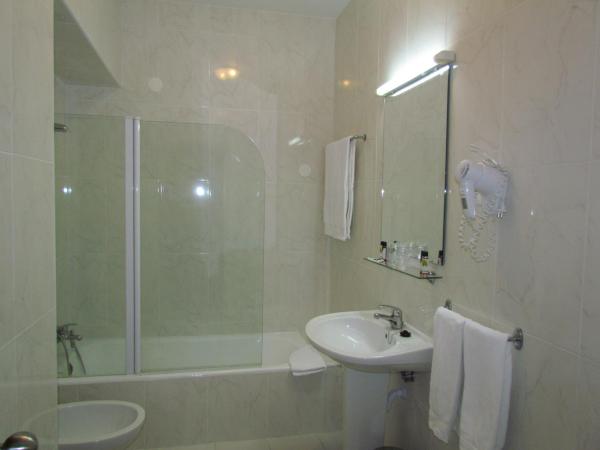 Vera Cruz Porto Downtown Hotel : photo 2 de la chambre chambre lits jumeaux