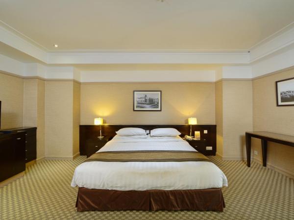 Pacific Regency Hotel Suites : photo 5 de la chambre chambre lit king-size deluxe