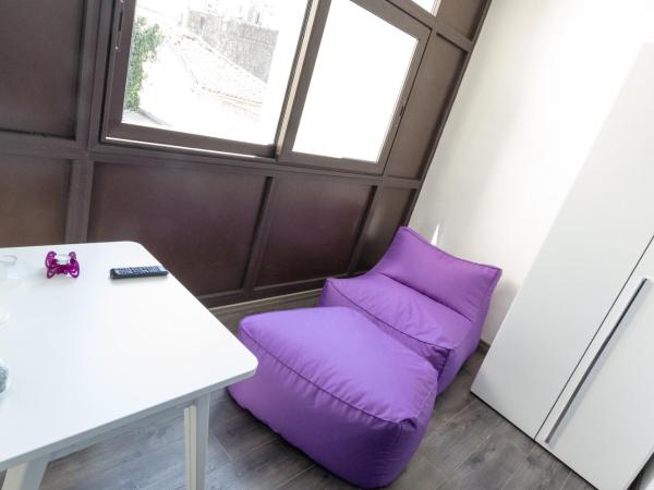 Etna Suite Group : photo 3 de la chambre chambre double avec coin salon