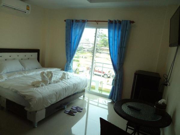 Bann Lom Le Guest House : photo 4 de la chambre chambre lit king-size avec balcon