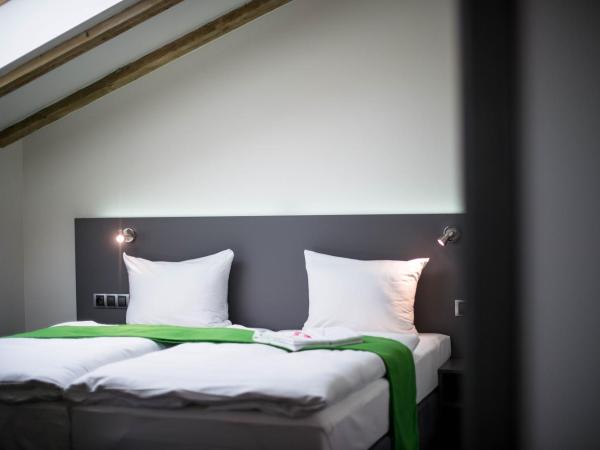 Hotel Herrmes : photo 5 de la chambre chambre quadruple deluxe