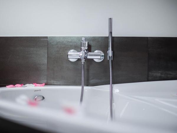 Hotel Herrmes : photo 8 de la chambre chambre quadruple deluxe