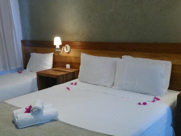 Pousada Praia João Fernandes : photo 2 de la chambre chambre triple standard