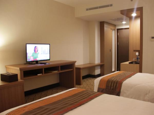 Cavinton Hotel Malioboro Yogyakarta by Tritama Hospitality : photo 3 de la chambre chambre double ou lits jumeaux supérieure communicante
