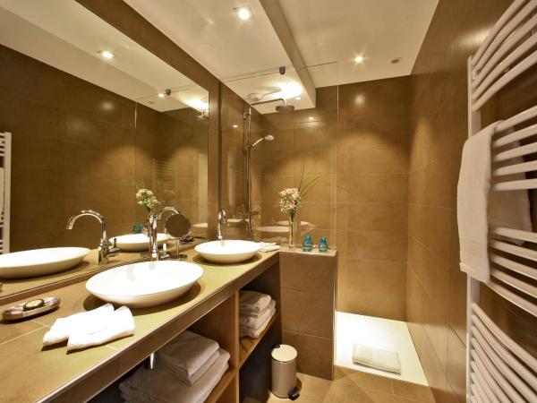 Les Jardins du Porche : photo 3 de la chambre appartement 2 chambres de luxe avec jardin privé