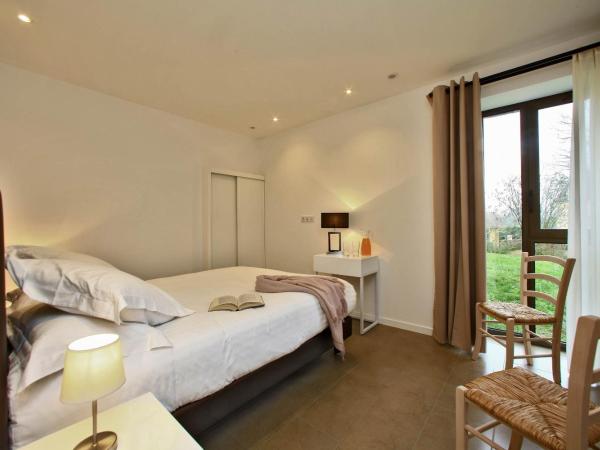 Les Jardins du Porche : photo 5 de la chambre appartement 2 chambres de luxe avec jardin privé