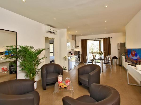 Les Jardins du Porche : photo 2 de la chambre appartement 2 chambres de luxe avec terrasse privée