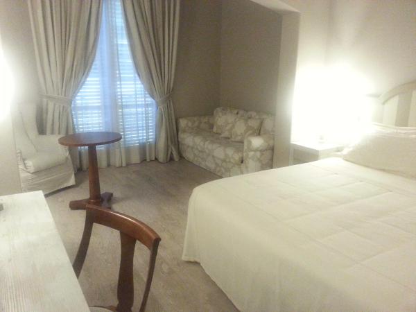 Grand Hotel Baia Verde : photo 4 de la chambre chambre triple
