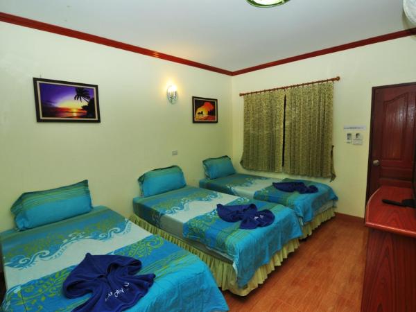 Harmony House-SHA Plus : photo 1 de la chambre chambre triple deluxe avec climatisation