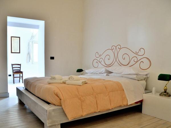 Azzurretta Guest House : photo 3 de la chambre grande chambre familiale
